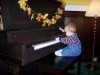 Nolan playing the piano at Windermere
